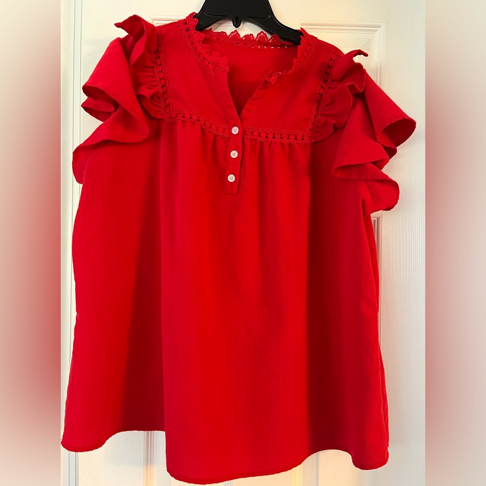 Red top with ruffled cap sleeves in great condition!